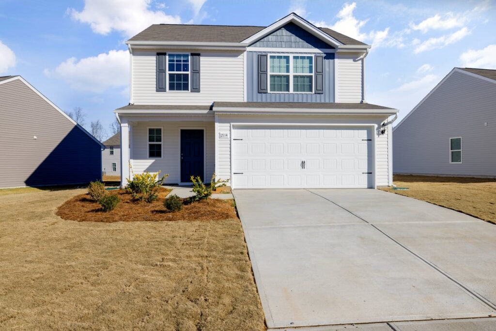 White and Blue House Under Blue Sky fix by Garage Door Repair Mountainside, NJ